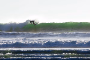 Cox bay surfer, cold water surfing, storm season, cox bay